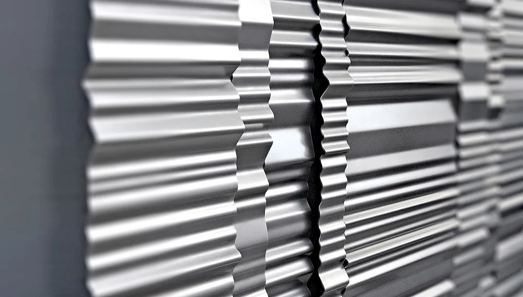 Close view of folded stainless steel reflecting light